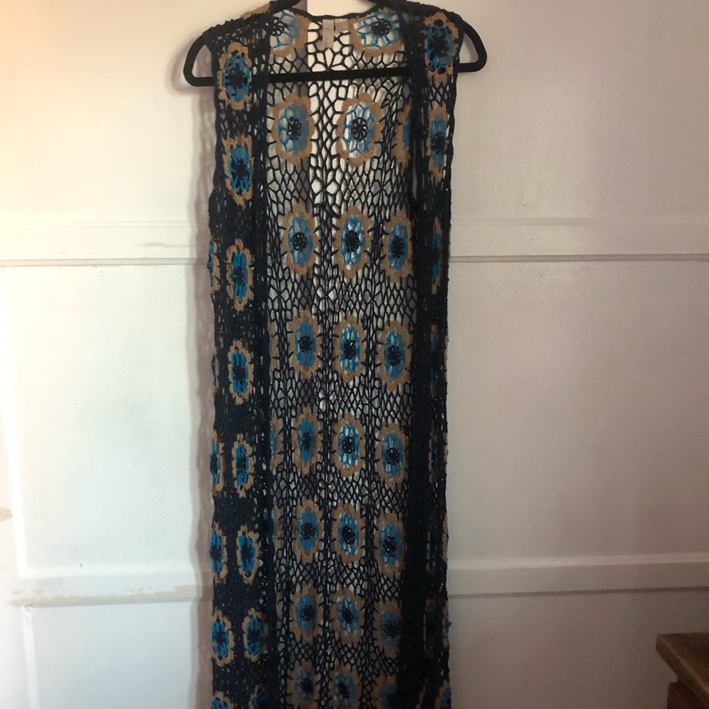 Forever21: Bohemian long knitted vest.